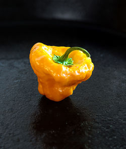 High angle view of yellow bell peppers on table