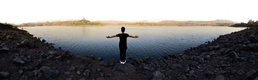 Scenic view of lake at sunset