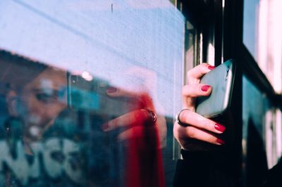 Close-up of hand using mobile phone