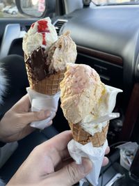 Hand holding ice cream