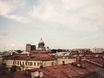 Buildings in city against sky