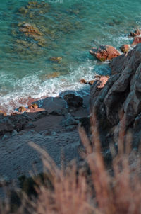 High angle view of rocks on beach