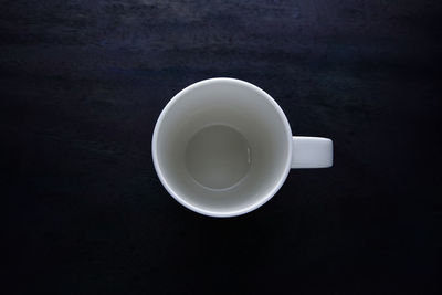 Directly above shot of coffee cup on table