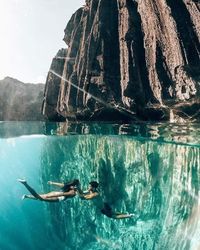 Man swimming in pool