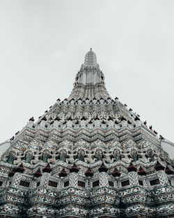 Low angle view of ornate building against sky