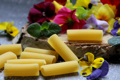 Close-up of yellow chili peppers on table