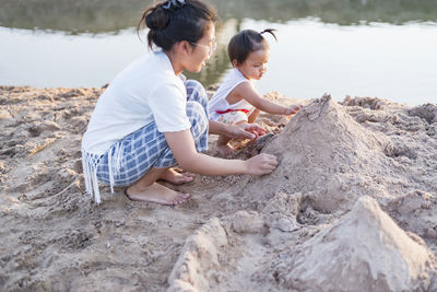 Portrait of happy loving mother and her baby outdoors. person