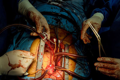 Midsection of man preparing food