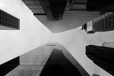 Low angle view of modern buildings against sky