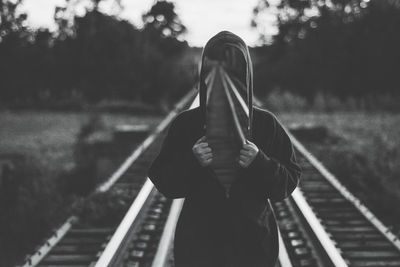 Woman standing against blurred background