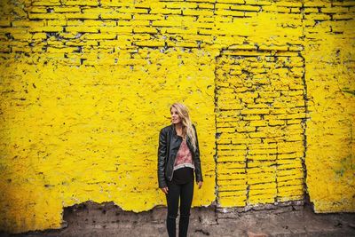 Man standing on wall