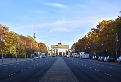 Road passing through city buildings