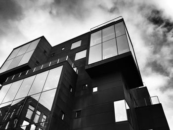 Low angle view of modern building against sky
