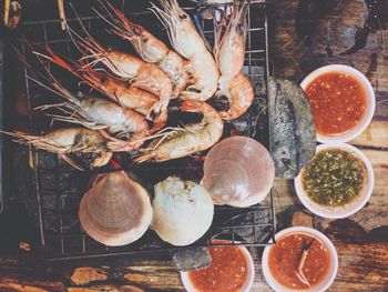 High angle view of prawns on grill