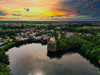 High angle view of bridge over river against sky during sunset