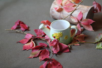 Close-up of pink roses on table