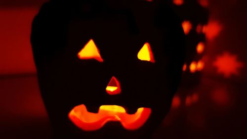 Close-up of illuminated halloween pumpkin