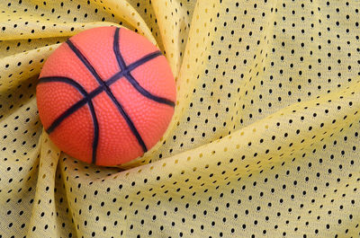 Directly above shot of basketball on textile