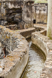 Stone wall in water