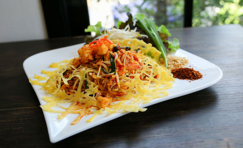 Close-up of pasta in plate on table