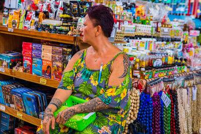 Full length of woman standing at market