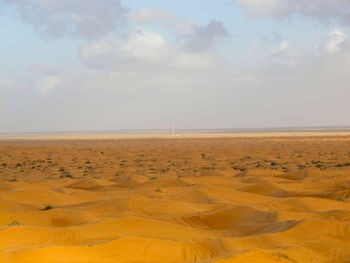 Scenic view of desert against sky