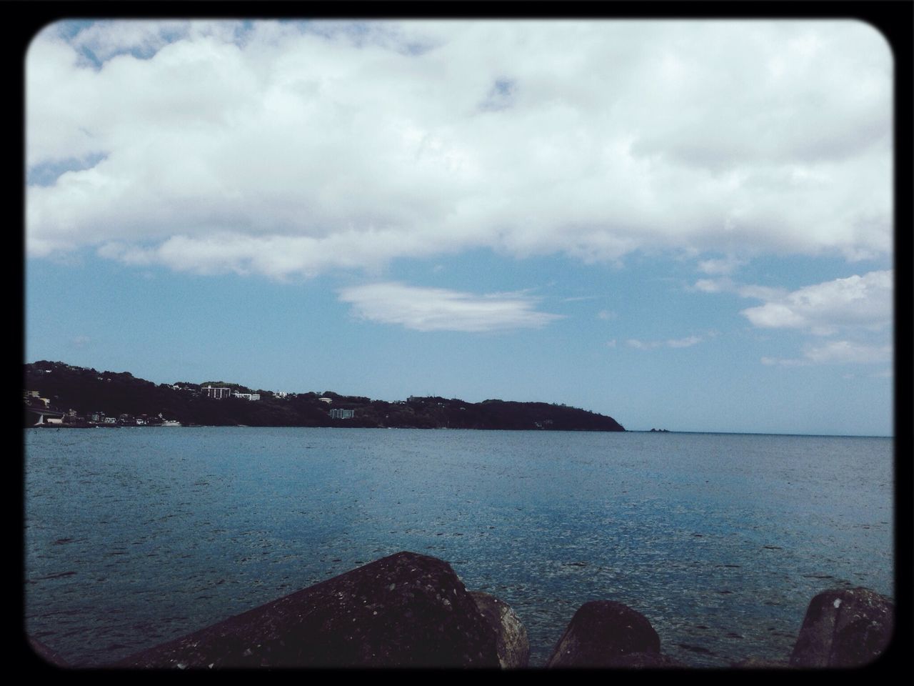 transfer print, water, sky, sea, auto post production filter, tranquil scene, scenics, beauty in nature, tranquility, cloud - sky, nature, cloudy, horizon over water, cloud, idyllic, rock - object, outdoors, shore, no people, day