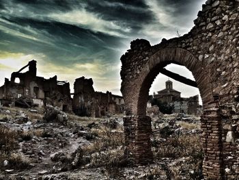 Old ruins against cloudy sky