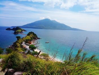 High angle view of sea against cloudy sky