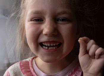 Close-up portrait of a smiling girl