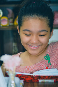 Portrait of a smiling young woman