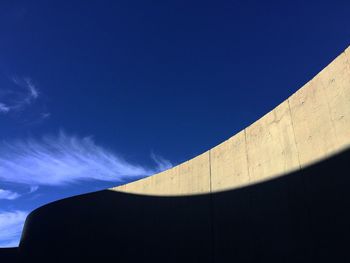 Low angle view of built structure against blue sky