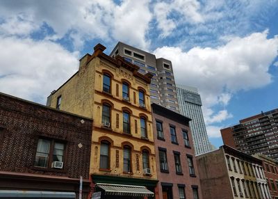 Low angle view of buildings against sky