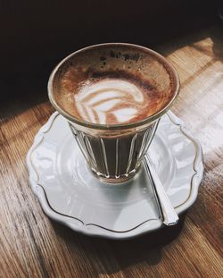 High angle view of cappuccino on table