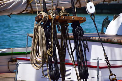 Ropes on boat in sea