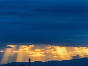 Scenic view of dramatic sky during sunset