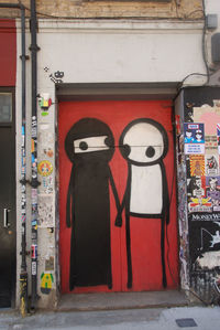 Graffiti on closed door of building