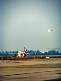 Cars on road against sky
