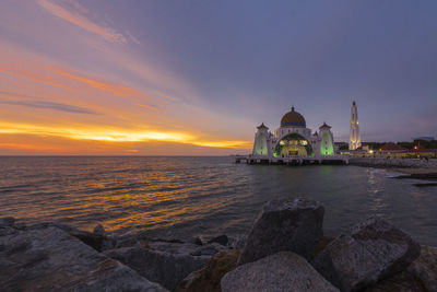 Scenic view of sea at sunset