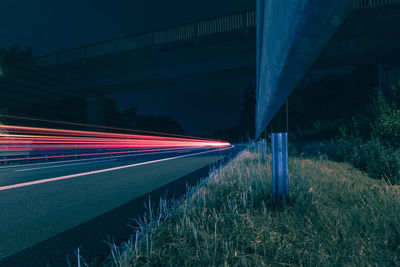 Light trails on road at night