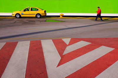 Rear view of woman on road