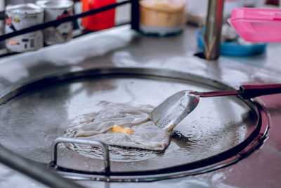 High angle view of fish in container on table