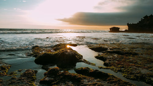 Scenic view of sea against sky during sunset