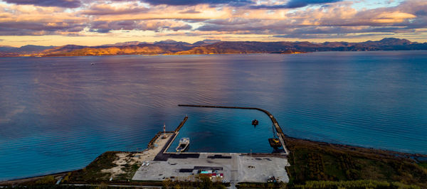 High angle view of sea against sky during sunset