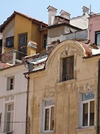 Low angle view of houses against sky