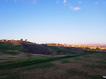 Scenic view of landscape against clear blue sky