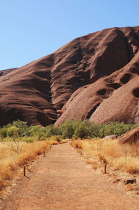 Scenic view of arid landscape against clear sky