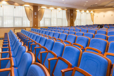 Empty chairs in stadium