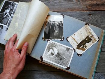 Old family album with old black and white photographs