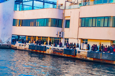 Group of people in front of building
